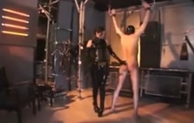 Submissive boy spanked by a mistress
